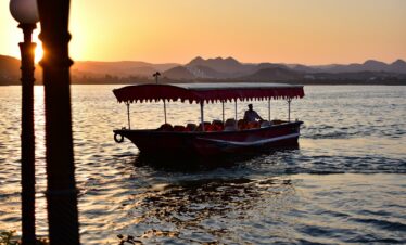man riding boat
